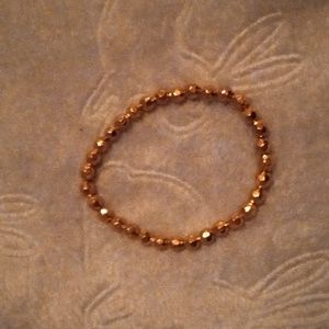 Minimalist handmade shiny and metallic fun casual gold bracelet